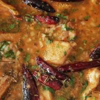 Menudo · Traditional Mexican soup, made with beef stomach (tripe) in broth with a red chili pepper ba...