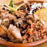 Carnitas Plato · Slow roasted pork, salsa fresca, grilled onoins, and chiles toreados