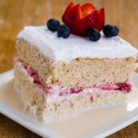 Tres Leches Cake · Homemade three milk vanilla cake with strawberry filling