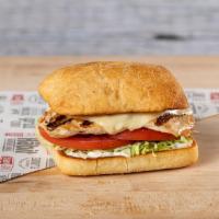Chicken Sandwich · Hand filleted chicken breast, melted white American cheese, crisp lettuce, tomato, mayo and ...