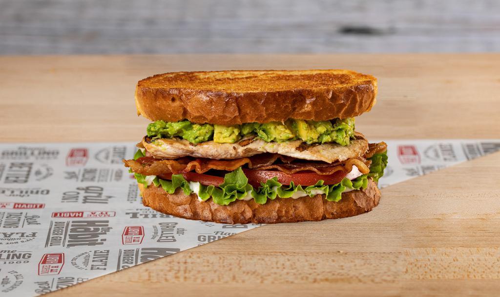 Chicken Club · Hand-filleted marinated chicken breast, green leaf lettuce, tomatoes, hickory-smoked bacon, fresh avocado, and mayo, served on toasted sourdough