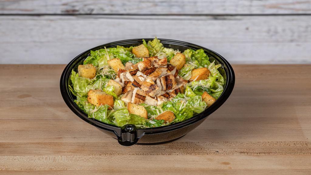 Grilled Chicken Caesar · Chopped Romaine tossed in our Caesar dressing, croutons, fresh Parmesan and topped with grilled chicken breast.