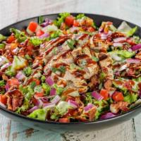 Bbq Chicken Salad · Chargrilled chicken breast atop garden greens, hickory-smoked bacon, diced red onions, diced...