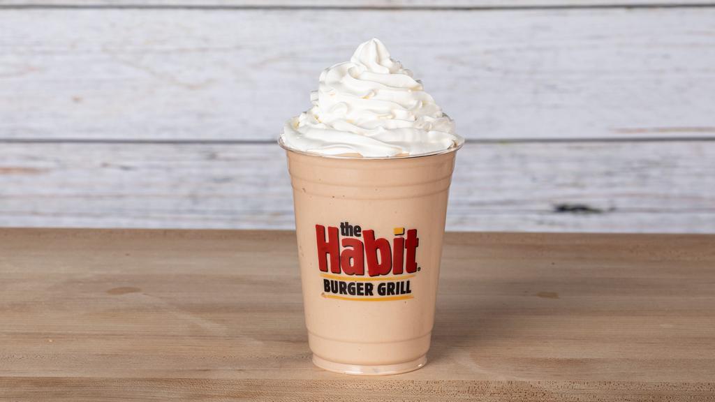 Chocolate Shake · A 16-oz. thick and rich hand blended chocolate shake topped with whipped cream. Handcrafted and made to order.