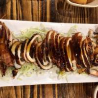 Grilled Squid · Grilled whole squid.
