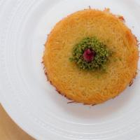 Knafeh Creme · Shredded filo dough (knafeh) mixed with butter, filled with unsweetened milk custard, baked ...