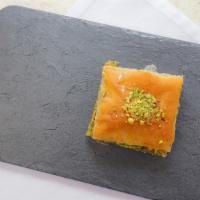 Pistachio Baklava · Layers of buttered fillo dough filled with pistachio and orange blossom water sweetened with...