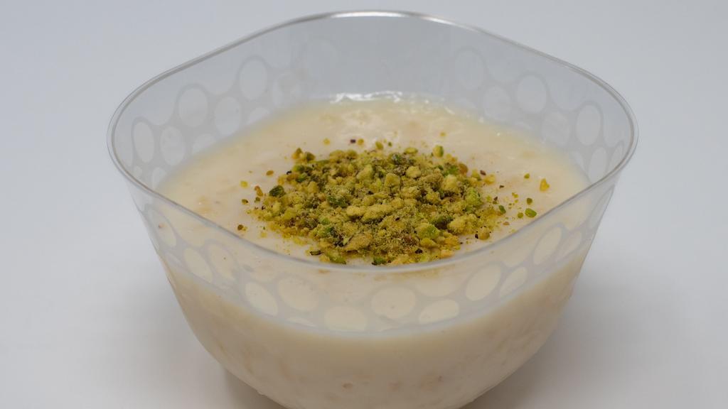 Rice Pudding · Aromatic rice pudding, flavored with Mastic and Orange blossom water,