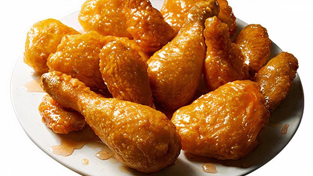 Y Boneless Honey Garlic · A soy based sauce that is sweet and savory infused with pungent pieces of garlic.