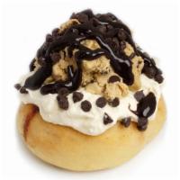 Cookie Monster Roll · cream cheese frosting  topped with cookie dough, chocolate chips and chocolate drizzle.