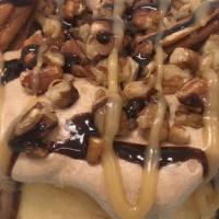 Mr Turtle Roll · chocolate frosting topped with pecans, chocolate sauce and caramel sauce