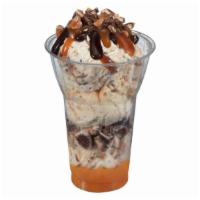Made With Snickers® Bars Layered Sundae · Three scoops of Made with SNICKERS® Bars Ice Cream, crushed SNICKERS® Bars pieces and carame...