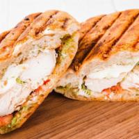 Chicken Panini · Pesto mayonnaise, tomato, and your choice of cheese.