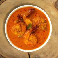 Pumpkin Shrimp Curry · Fresh shrimp cooked in a tomato based onion gravy with Burmese spices.