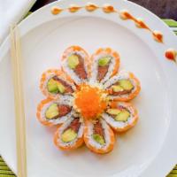 Orange Blossom Roll · Spicy tuna, avocado topped with salmon.