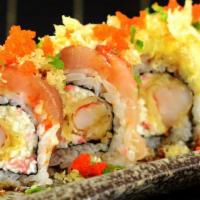Joe's Roll · Crabmeat and shrimp tempura topped with albacore, avocado, tobiko and tempura flakes on top.
