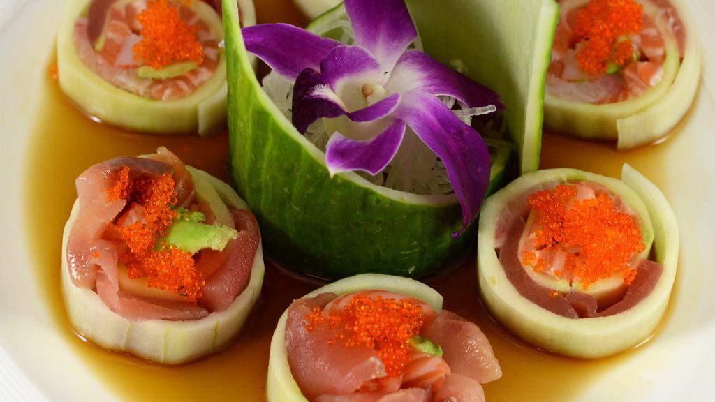 Low Carb Roll · Tuna, salmon, hamachi, crabmeat, avocado, wrapped with cucumber, tobiko, no rice.