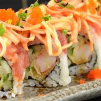 Titanic Roll · Shrimp tempura and cucumber topped with tuna, salmon, and spicy crab meat.