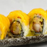 Mango Roll · Lobster salad, shrimp, tempura topped with mango.