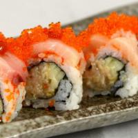 Hamachi Deluxe Roll · Spicy hamachi and cucumber topped with hamachi, tobiko and spicy sauce