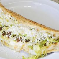 Handmade Quesadilla · Prep with lettuce and cheese