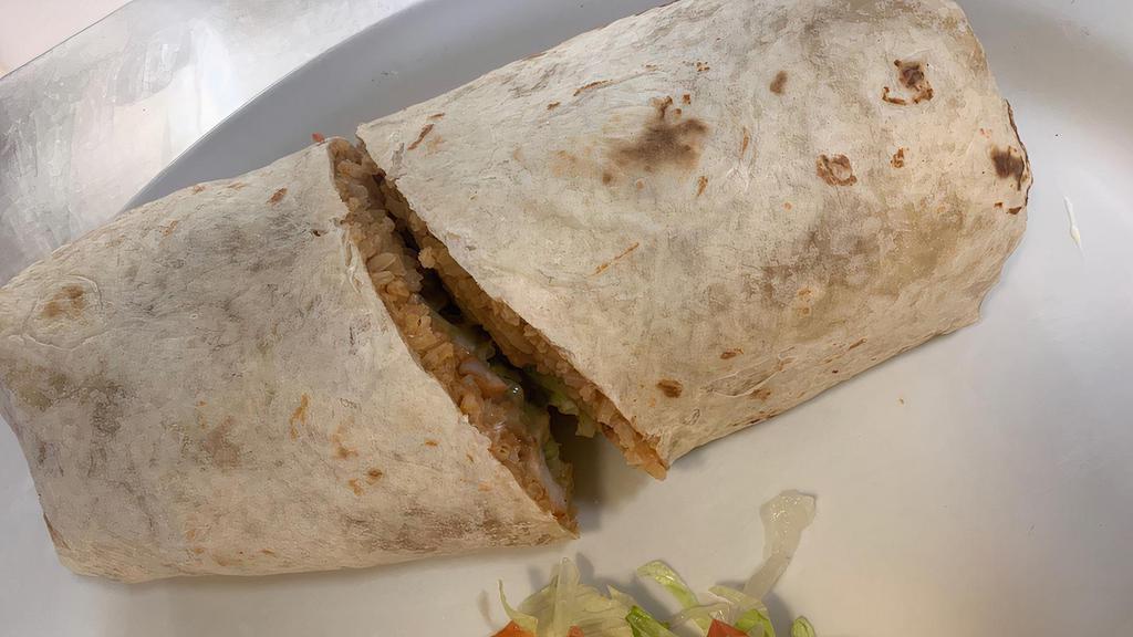 Super Burrito · choice of meat, rice, beans, cheese, guacamole, lettuce, sour cream, pico de gallo and salsa