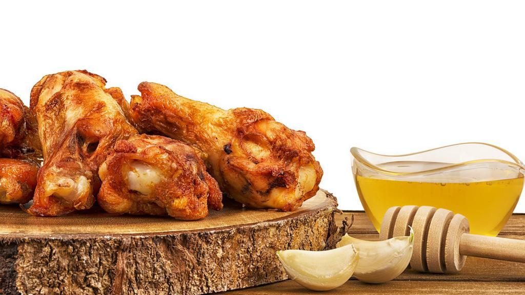 Halal Honey Garlic Fried Wings · Halal! Batch of crispy breaded wings tossed in exotic honey garlic sauce.