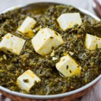 Palak Paneer · Spinach cooked with tender cheese cubes and mild spices.