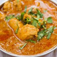 Chicken Curry · Chicken cooked in authentic gravy.