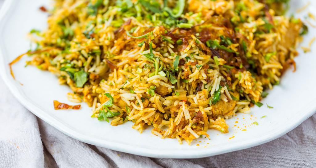 Chicken Biryani · Boneless chicken and rice cooked together with exotic spices.