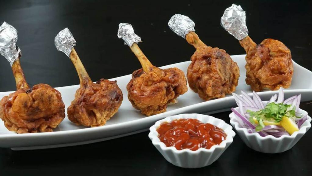 Drums of heaven (Chicken Lollipop) · #Wings #Indian#Spicy Drums of heaven are an hors d'oeuvre popular in Indian Chinese cuisine. Our winglets are spiced in our secret spices to add zing to them.