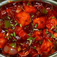 Chilli Paneer · Deep fried indian cottage cheese sautéed with diced onions and bell peppers in chef's specia...