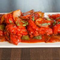 Chilli Fish · Boneless pieces of fish, batter fried and doused in a spicy-tangy sauce made with soy, tomat...
