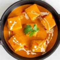 Shahi Paneer · Indian cheese cooked in thick spinach gravy of cream, tomatoes and Indian spices.