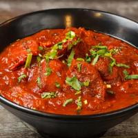 Chicken Vindaloo · A combination of chicken and potatoes marinated in vinegar, hot pepper and spices cooked in ...