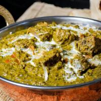 Chicken Saag · Tender boneless chicken cooked in fresh blended spinach | garlic and house special mild spic...