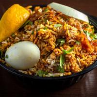 Chicken Biryani-Anglo Special · Boneless chicken with premium basmati rice cooked in traditional Indian spices and aromatic ...
