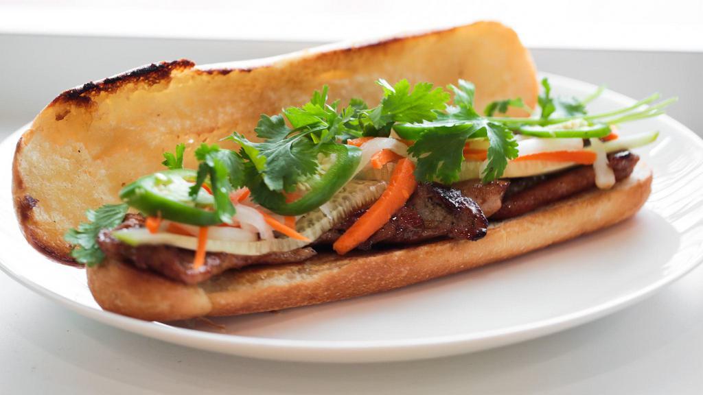 Vietnamese Chicken Sandwich  · Grill chicken, pickled daikon and carrot, sliced jalapeños, cilantro, cucumber