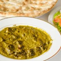 Palak Aloo · Potato and spinach with naan or rice.