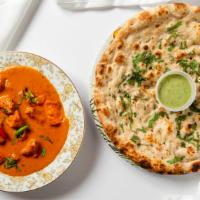 Chicken Tikka Masala · Cubed roasted marinated chicken in a spiced curry sauce with rice or naan.