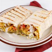 Chicken Shawarma Wrap  · Chicken with spices wrapped in lavash bread, tahini sauce, hummus, tomatoes, cucumber, pickl...