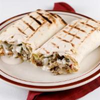 Beef Kefta Kabab Wrap · Ground beef mixed with onion, garlic, parsley and spices wrapped in lavash bread with tahini...