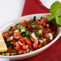 Arabic Salad · Tomato, cucumber, parsley with olive oil and lemon.
