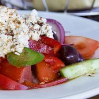 Greek Salad · Fresh lettuce, tomato, cucumber, feta, green peppers, kalamata olives and shrimp, tossed wit...