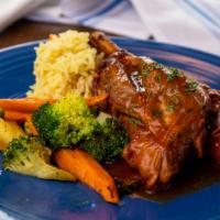 Tasso’s Famous Lamb Shank · A specialty and tradition since 1974, deliciously seasoned, braised lamb shank, drizzled lam...