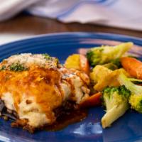 Moussaka · A Greek comfort food classic, this Greek casserole is layered with fresh eggplant, onion, ga...