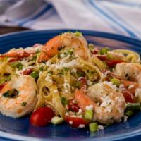 Athenian Prawns · Sautéed jumbo prawns, extra virgin olive oil, fresh garlic, tomatoes, sweet basil, tossed in...