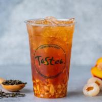 Lychee Peachee · peach black tea with diced lychee