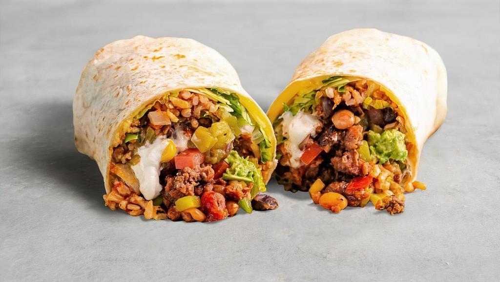 The Loaded Burrito  · Seasoned Impossible ™ taco meat with brown rice, chili beans, 2x pepper jack cheese, 2x guacamole, 2x baja sauce, shredded lettuce, green chilis, and pico de gallo