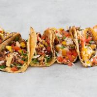 Taco 6 Pack · 6 Tacos | Select from two (2) styles | Make It a Meal & Add a Side of Rice, Beans, Chips & Q...